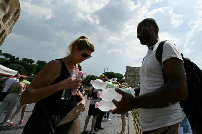 'You have to work:' Delivery riders brave Rome heat for survival