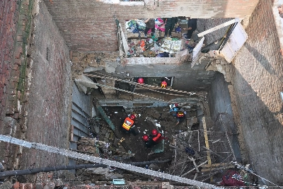 Monsoon rain triggers house collapse in Pakistan's Lahore city, killing 9 family members