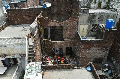Monsoon rain triggers house collapse in Pakistan's Lahore city, killing 9 family members
