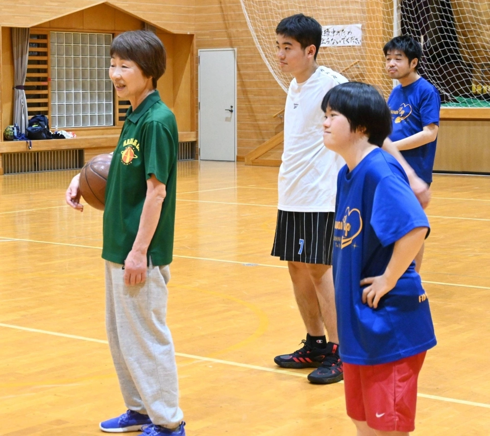 Yoshiko Hara (left) plays basketball with members of her Fukushima Club basketball team. Yoshiko Hara (left) plays basketball with members of her Fukushima Club basketball team.