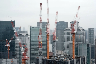 A building under construction in Osaka. Singapore investors are snapping up Japanese real estate, particularly in Osaka where a large casino resort is set to open. A building under construction in Osaka. Singapore investors are snapping up Japanese real estate, particularly in Osaka where a large casino resort is set to open.
