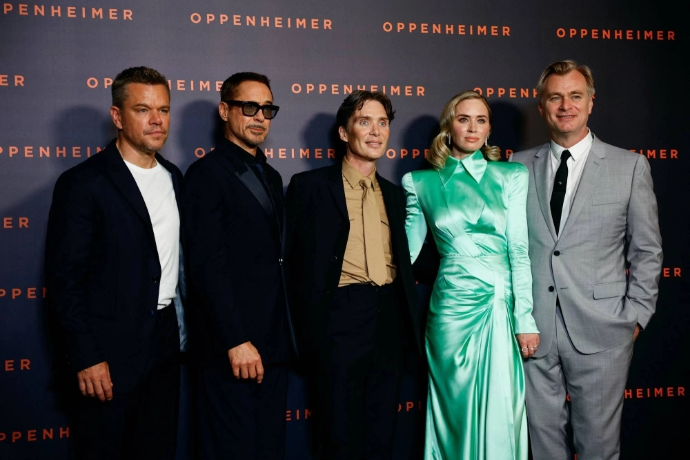 Director Christopher Nolan (right) poses with "Oppenheimer" cast members (from left) Matt Damon, Robert Downey Jr., Cillian Murphy and Emily Blunt at the film's premiere in Paris earlier this month.  Director Christopher Nolan (right) poses with "Oppenheimer" cast members (from left) Matt Damon, Robert Downey Jr., Cillian Murphy and Emily Blunt at the film's premiere in Paris earlier this month.
