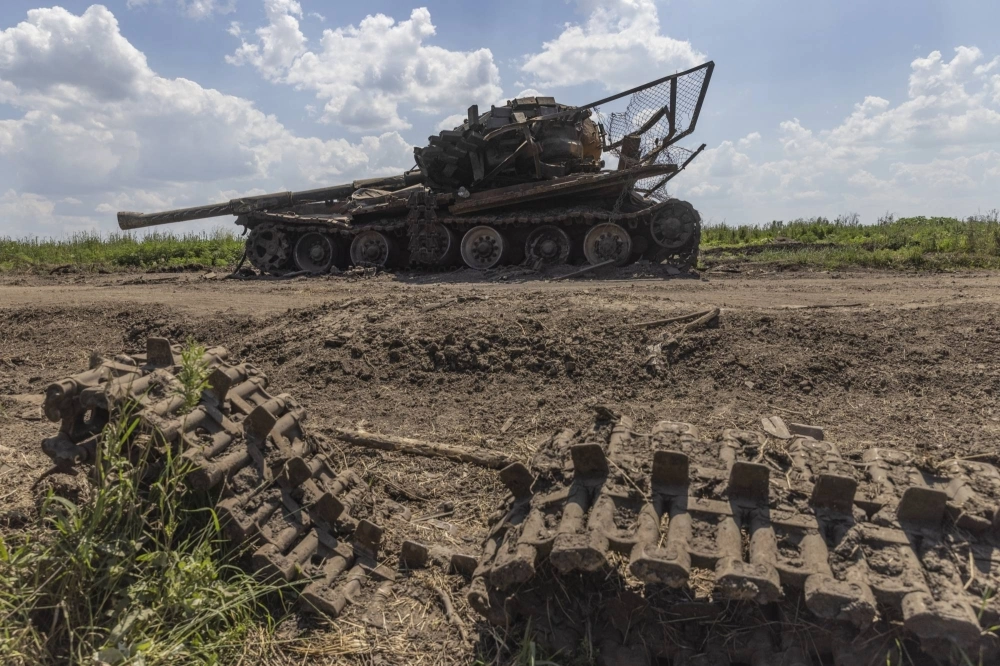 A destroyed Russian tank in the village of Novodarlivka, Ukraine, which was recaptured by Ukrainian forces, on July 6. A destroyed Russian tank in the village of Novodarlivka, Ukraine, which was recaptured by Ukrainian forces, on July 6.