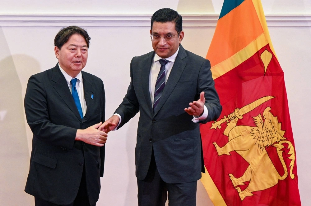 Foreign Minister Yoshimasa Hayashi and his Sri Lanka counterpart, Ali Sabry, during a joint news conference in Colombo on Saturday Foreign Minister Yoshimasa Hayashi and his Sri Lanka counterpart, Ali Sabry, during a joint news conference in Colombo on Saturday