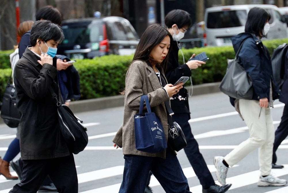 Commuters in Tokyo in March. Japanese women are paid on average around 67% the salaries of men, according to a report based on around 2,000 firms’ financial statements, compiled by advisory firm Willis Towers Watson and others this month.  Commuters in Tokyo in March. Japanese women are paid on average around 67% the salaries of men, according to a report based on around 2,000 firms’ financial statements, compiled by advisory firm Willis Towers Watson and others this month.