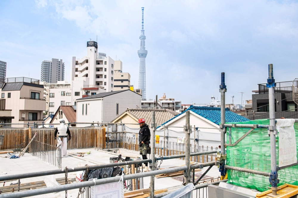 An apartment building construction site in Sumida Ward, Tokyo, on July 19. Officials at Daito Trust Construction, which oversees the building project, say heatstroke dangers are a top concern given their aging workforce. An apartment building construction site in Sumida Ward, Tokyo, on July 19. Officials at Daito Trust Construction, which oversees the building project, say heatstroke dangers are a top concern given their aging workforce.