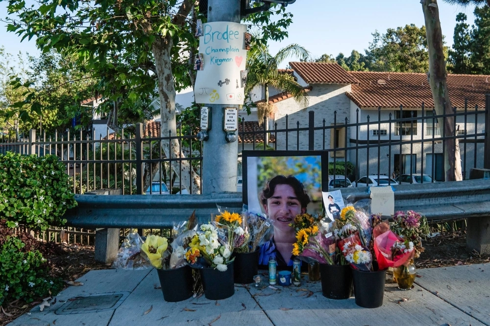 A memorial for Brodee Champlain Kingman on the corner of El Camino Real and Santa Fe Drive in Encinitas, California, on Thursday. The e-bike industry is booming, but many vehicles are not legal for teenagers, and accidents are on the rise. A memorial for Brodee Champlain Kingman on the corner of El Camino Real and Santa Fe Drive in Encinitas, California, on Thursday. The e-bike industry is booming, but many vehicles are not legal for teenagers, and accidents are on the rise.
