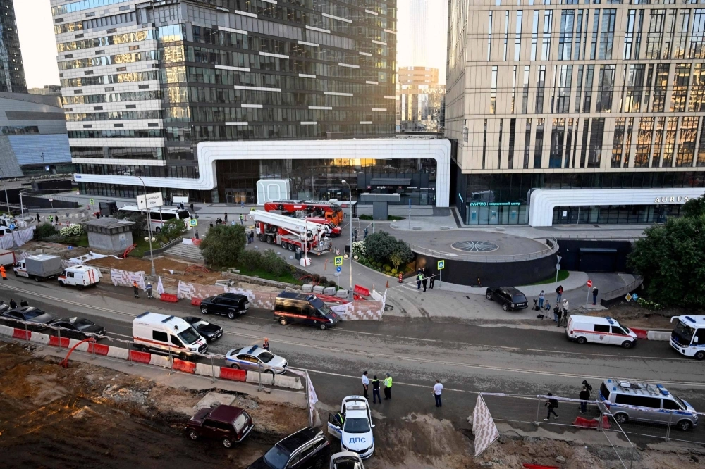 Emergency personnel work outside a damaged office block of the Moskva Citi business complex following a reported drone attack in Moscow on Tuesday. Emergency personnel work outside a damaged office block of the Moskva Citi business complex following a reported drone attack in Moscow on Tuesday.