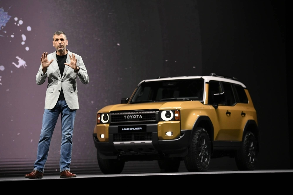 Simon Humphries, head of design at Toyota, speaks during the world premier of the new Land Cruiser in Tokyo on Wednesday. Simon Humphries, head of design at Toyota, speaks during the world premier of the new Land Cruiser in Tokyo on Wednesday.
