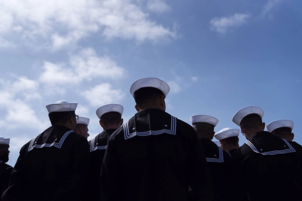 Two U.S. Navy sailors have been arrested on charges of providing sensitive U.S. military information to China. Both men are Chinese-born naturalized U.S. citizens. Two U.S. Navy sailors have been arrested on charges of providing sensitive U.S. military information to China. Both men are Chinese-born naturalized U.S. citizens.