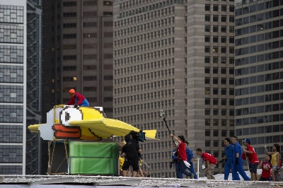 A participant operates the "Flappy Bird," a self-made flying machine, during an event in Hong Kong in May 2014. Vietnam first caught the attention of global gamers in 2013 after Hanoi developer Dong Nguyen created, Flappy Bird, a simple but addictive game app. A participant operates the "Flappy Bird," a self-made flying machine, during an event in Hong Kong in May 2014. Vietnam first caught the attention of global gamers in 2013 after Hanoi developer Dong Nguyen created, Flappy Bird, a simple but addictive game app.