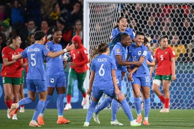 France players celebrate midfielder Kenza Dali's (right) goal against Morocco in the 2023 FIFA Women's World Cup round of 16 in Adelaide, Australia, on Tuesday. France players celebrate midfielder Kenza Dali's (right) goal against Morocco in the 2023 FIFA Women's World Cup round of 16 in Adelaide, Australia, on Tuesday.