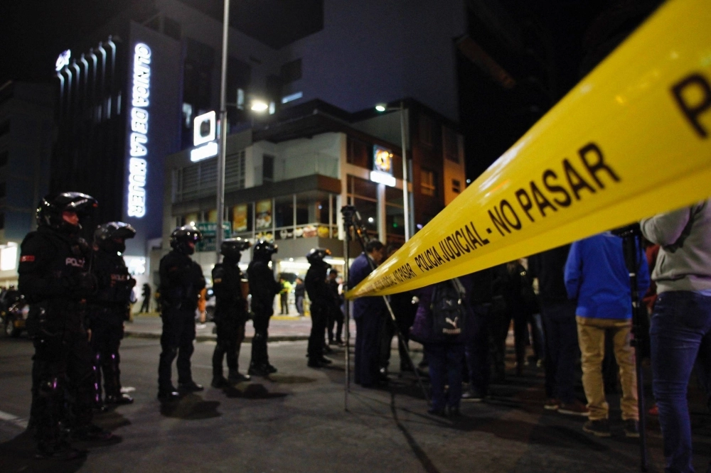 Policemen stand guard outside the hospital where presidential candidate Fernando Villavicencio was taken after being shot at a rally in Quito on Wednesday. Mr. Villavicencio, a 59-year-old journalist, was one of eight candidates in the Aug. 20 presidential election. Policemen stand guard outside the hospital where presidential candidate Fernando Villavicencio was taken after being shot at a rally in Quito on Wednesday. Mr. Villavicencio, a 59-year-old journalist, was one of eight candidates in the Aug. 20 presidential election.