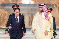 Prime Minister Fumio Kishida meets with Saudi Crown Prince Mohammed bin Salman in Jeddah, Saudi Arabia, last month. | SPA / via AFP-JIJI