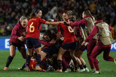 Spain's players celebrate defender Olga Carmona's game-winning goal against Sweden during their 2023 FIFA Women's World Cup semifinal in Auckland on Tuesday. Spain's players celebrate defender Olga Carmona's game-winning goal against Sweden during their 2023 FIFA Women's World Cup semifinal in Auckland on Tuesday.
