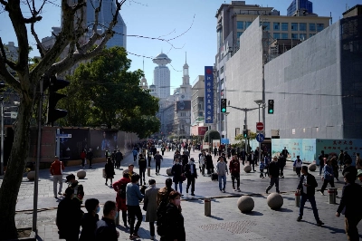 People walk along Shanghai's main shopping area on March 14. China's economic activity data has been missing forecasts, raising worries that the country is approaching a crunch point. People walk along Shanghai's main shopping area on March 14. China's economic activity data has been missing forecasts, raising worries that the country is approaching a crunch point.