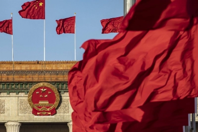 Chinese national flags fly over Tiananmen Square along with other red flags ahead of the fifth plenary session of the First Session of the 14th National People's Congress (NPC) at the Great Hall of the People in Beijing on March 12. Chinese national flags fly over Tiananmen Square along with other red flags ahead of the fifth plenary session of the First Session of the 14th National People's Congress (NPC) at the Great Hall of the People in Beijing on March 12.