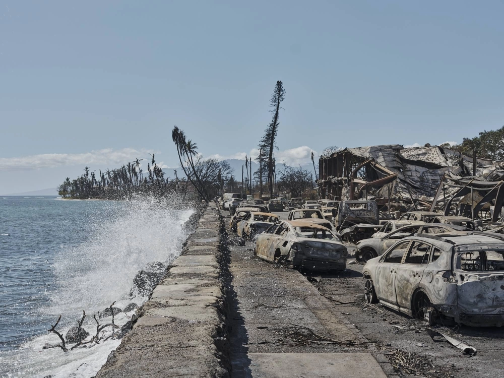 Destroyed buildings and cars along Front Street in Lahaina, Hawaii, two days after the historic town on Maui was devastated by wildfire on Aug. 11.  Destroyed buildings and cars along Front Street in Lahaina, Hawaii, two days after the historic town on Maui was devastated by wildfire on Aug. 11.