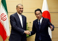 Prime Minister Fumio Kishida meets with Iranian Foreign Minister Hossein Amirabdollahian in Tokyo on Aug. 7.   | REUTERS