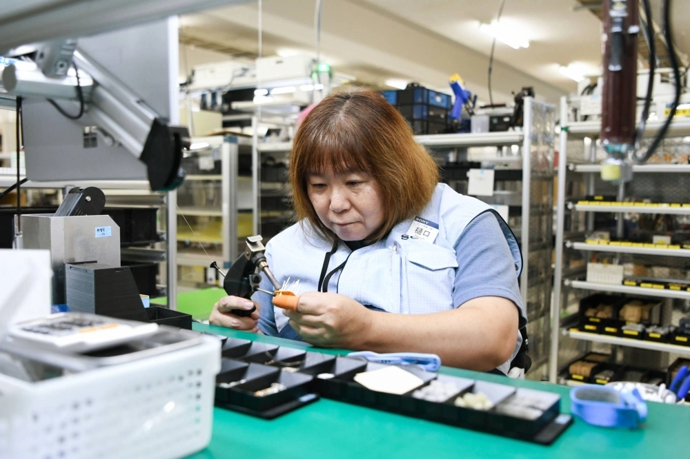 Eiko Higuchi at her microphone production station at Sony Taiyo Eiko Higuchi at her microphone production station at Sony Taiyo