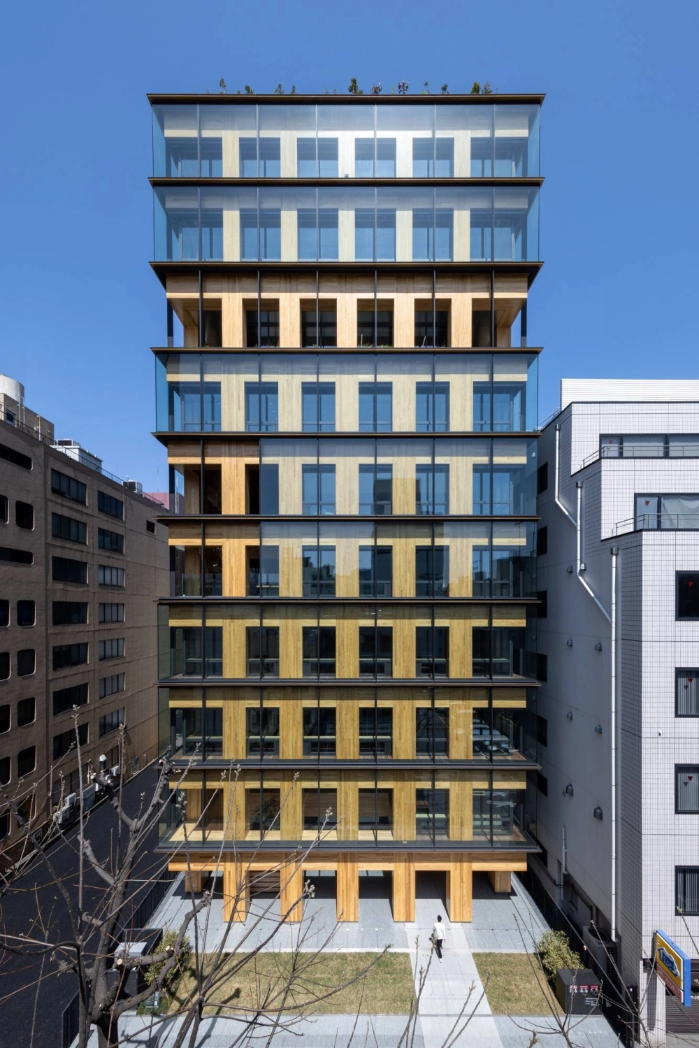 The Port Plus building in Yokohama. Obayashi estimates that the Port Plus building reduces life-cycle carbon dioxide emissions by about 1,700 tons — a 40% cut in comparison to a similar building built using steel. The Port Plus building in Yokohama. Obayashi estimates that the Port Plus building reduces life-cycle carbon dioxide emissions by about 1,700 tons — a 40% cut in comparison to a similar building built using steel.