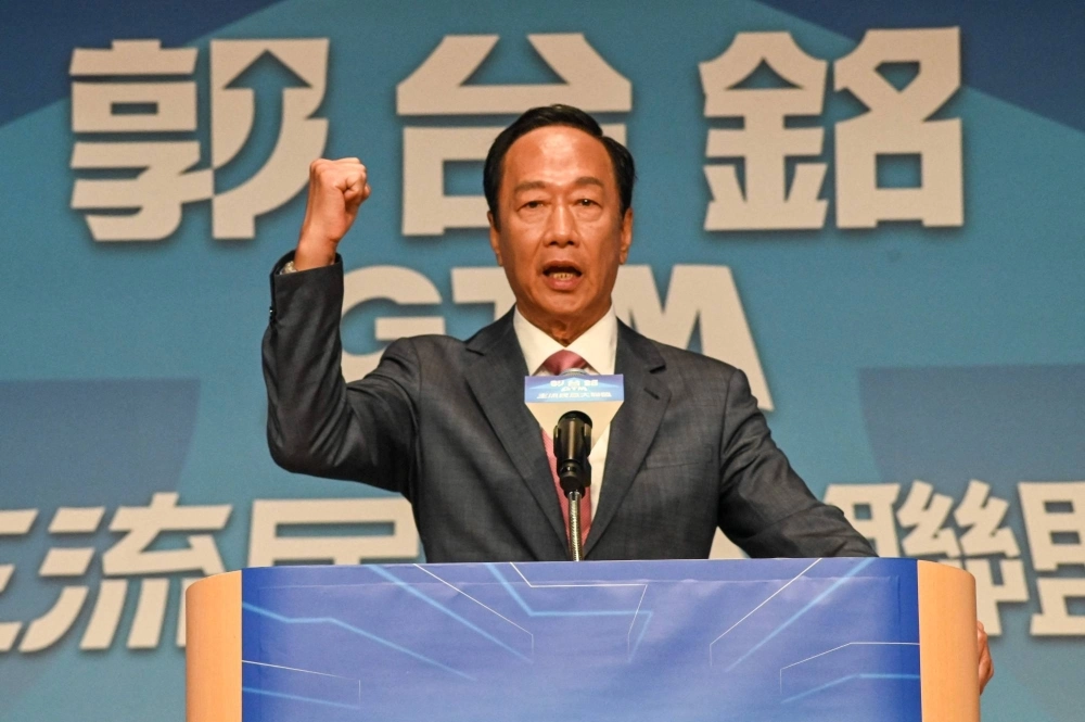 Former Foxconn founder Terry Gou gestures during a news conference in Taipei on Monday. Gou announced that he will run for president of Taiwan as an independent candidate. Former Foxconn founder Terry Gou gestures during a news conference in Taipei on Monday. Gou announced that he will run for president of Taiwan as an independent candidate.