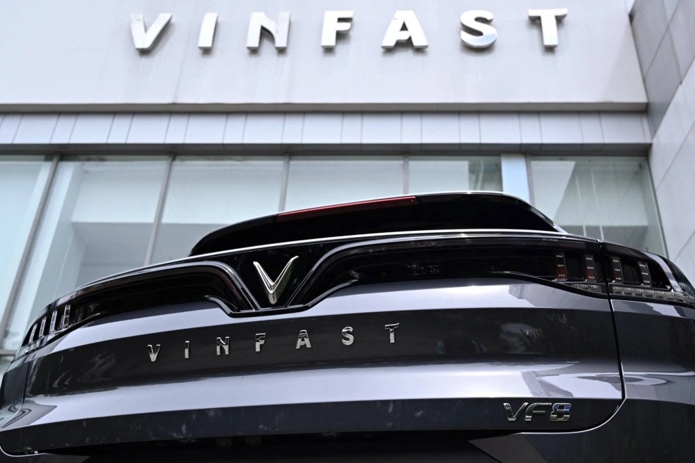 A VinFast electric car is parked outside a showroom in Hanoi on Aug. 18. A VinFast electric car is parked outside a showroom in Hanoi on Aug. 18.