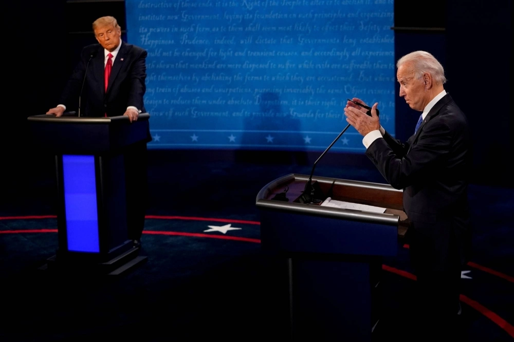 Then Democratic presidential candidate Joe Biden and U.S. President Donald Trump meet during their final debate ahead of the 2020 election, in Nashville, Tennessee, in October of that year. Then Democratic presidential candidate Joe Biden and U.S. President Donald Trump meet during their final debate ahead of the 2020 election, in Nashville, Tennessee, in October of that year.