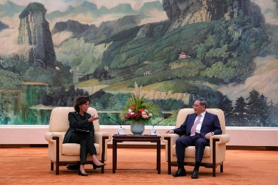 China's Premier Li Qiang (right) speaks with U.S, Commerce Secretary Gina Raimondo during their meeting at the Great Hall of the People in Beijing on Tuesday. China's Premier Li Qiang (right) speaks with U.S, Commerce Secretary Gina Raimondo during their meeting at the Great Hall of the People in Beijing on Tuesday.