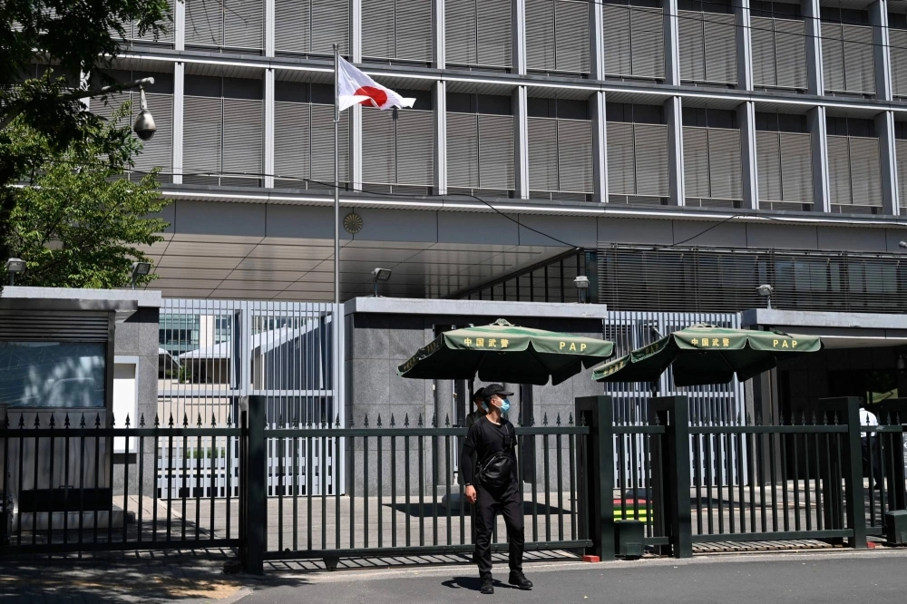 Police and security personnel stand outside the entrance of the Japanese Embassy in Beijing on Tuesday. Japan said that harassment being faced by its citizens in China after the Fukushima water release was "extremely regrettable," confirming that a brick was thrown at the country's embassy in Beijing. Police and security personnel stand outside the entrance of the Japanese Embassy in Beijing on Tuesday. Japan said that harassment being faced by its citizens in China after the Fukushima water release was "extremely regrettable," confirming that a brick was thrown at the country's embassy in Beijing.