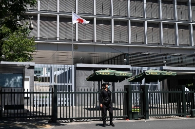Police and security personnel stand outside the entrance of the Japanese Embassy in Beijing on Tuesday. Japan said that harassment being faced by its citizens in China after the Fukushima water release was "extremely regrettable," confirming that a brick was thrown at the country's embassy in Beijing. Police and security personnel stand outside the entrance of the Japanese Embassy in Beijing on Tuesday. Japan said that harassment being faced by its citizens in China after the Fukushima water release was "extremely regrettable," confirming that a brick was thrown at the country's embassy in Beijing.