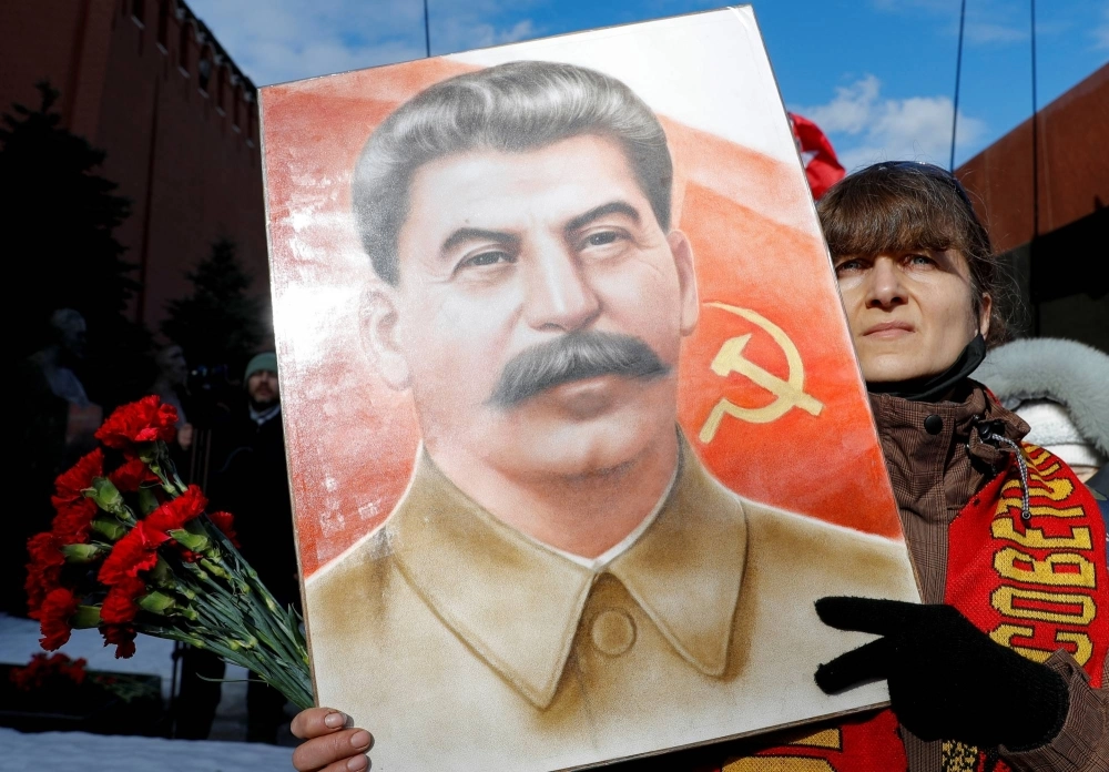 Russian Communist Party supporters attend a ceremony in Red Square on March 5, 2021, marking the 68th anniversary of Soviet leader Josef Stalin’s death. Russian Communist Party supporters attend a ceremony in Red Square on March 5, 2021, marking the 68th anniversary of Soviet leader Josef Stalin’s death.