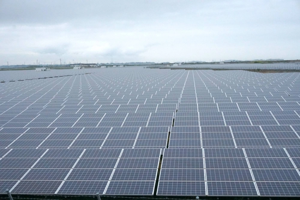 Solar panels in Minamisoma. The plant's panels, if laid out side by side, would cover 350 kilometers. Solar panels in Minamisoma. The plant's panels, if laid out side by side, would cover 350 kilometers.