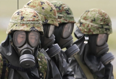 Personnel from the Self-Defense Forces take part in a nuclear, biological and chemical weapons exercise at New Chitose airport in Hokkaido in July 2012. Personnel from the Self-Defense Forces take part in a nuclear, biological and chemical weapons exercise at New Chitose airport in Hokkaido in July 2012.