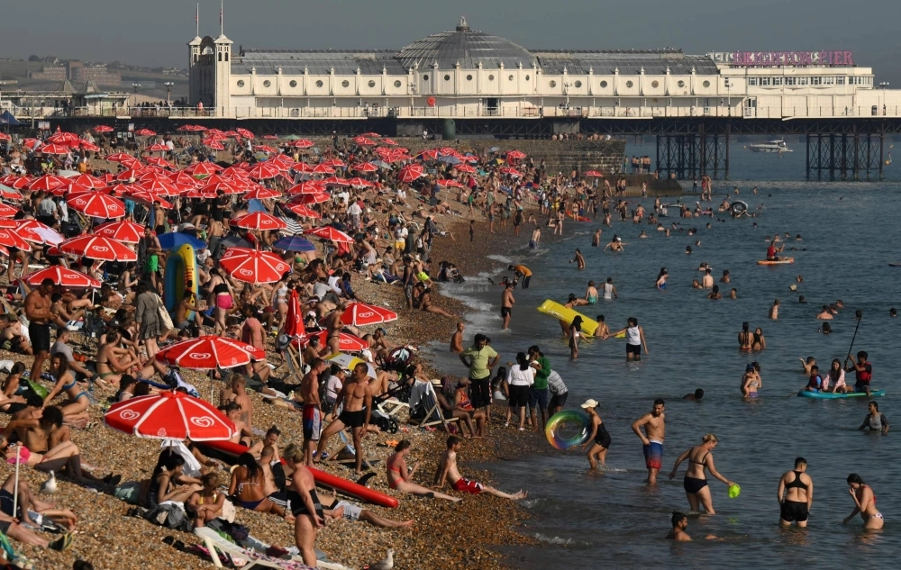 The beach at Brighton, on the south coast of England on Thursday, as the late summer heat wave continues. The beach at Brighton, on the south coast of England on Thursday, as the late summer heat wave continues.