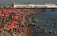 The beach at Brighton, on the south coast of England on Thursday, as the late summer heat wave continues. | AFP-Jiji