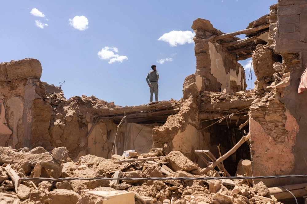 A villager amongst the rubble of destroyed buildings following an earthquake near the town of Amizmiz, in the Al Haouz region of Morocco, on Sunday. A villager amongst the rubble of destroyed buildings following an earthquake near the town of Amizmiz, in the Al Haouz region of Morocco, on Sunday.