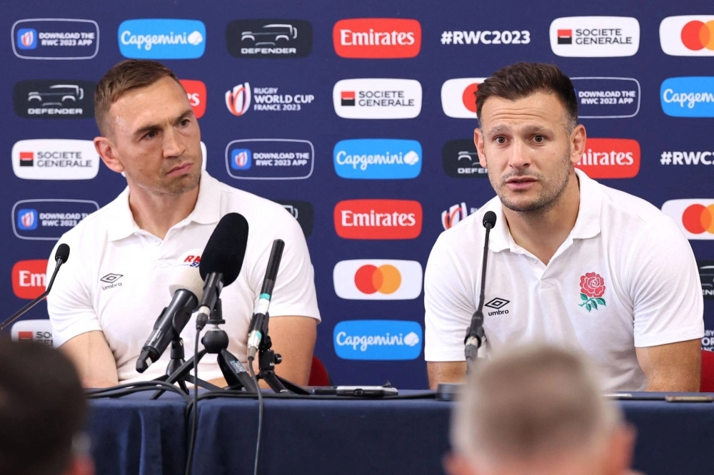 England defense coach Kevin Sinfield (left) and scrumhalf Danny Care speak with reporters during a news conference in Le Touquet-Paris-Plage, France, prior to the Rugby World Cup. England defense coach Kevin Sinfield (left) and scrumhalf Danny Care speak with reporters during a news conference in Le Touquet-Paris-Plage, France, prior to the Rugby World Cup.