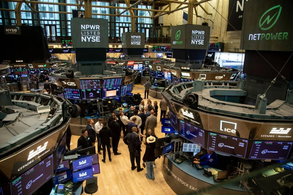 Traders work on the floor of the New York Stock Exchange.  Traders work on the floor of the New York Stock Exchange.