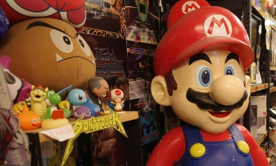 Characters from the Super Mario Bros. franchise adorn the front of Super Potato, a well-known retro game shop in Akihabara.  Characters from the Super Mario Bros. franchise adorn the front of Super Potato, a well-known retro game shop in Akihabara.