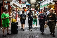 People visit the area near Sensoji Temple, a popular tourist destination, in Tokyo's Asakusa district on Sept. 7. | AFP-JIJI