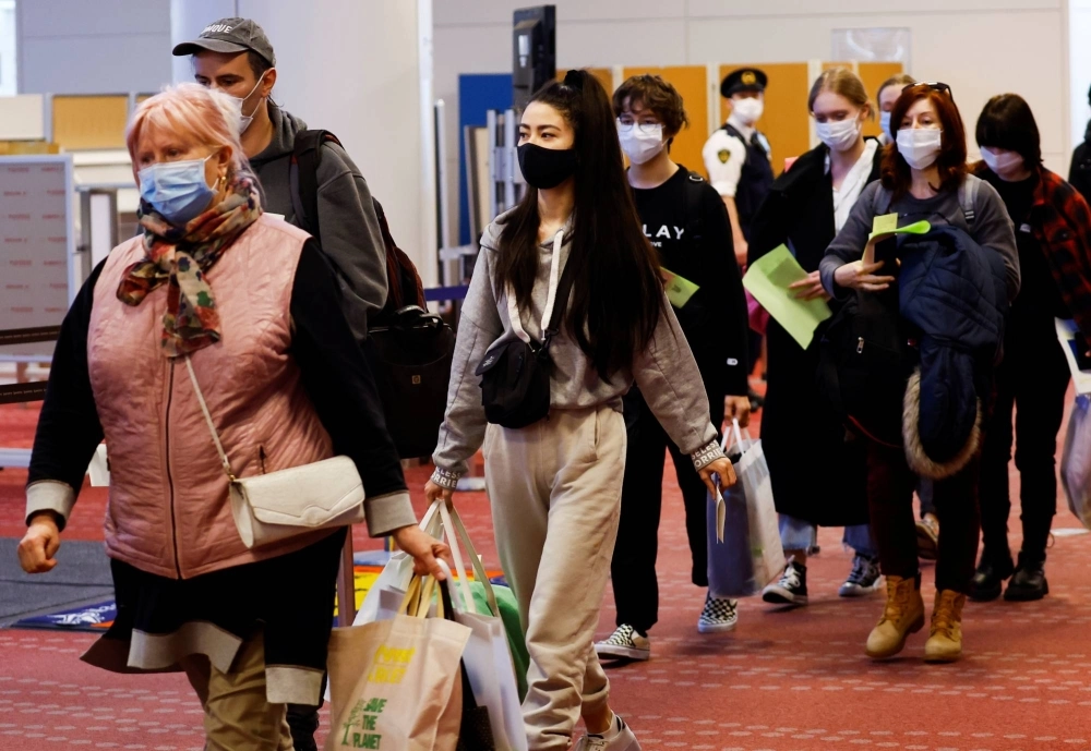 Ukrainian refugees arrive at Haneda airport in Tokyo on April 5, 2022. Ukrainian refugees arrive at Haneda airport in Tokyo on April 5, 2022.