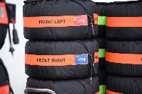 Stacks of tires during race weekend at Suzuka Circuit | Dan Orlowitz