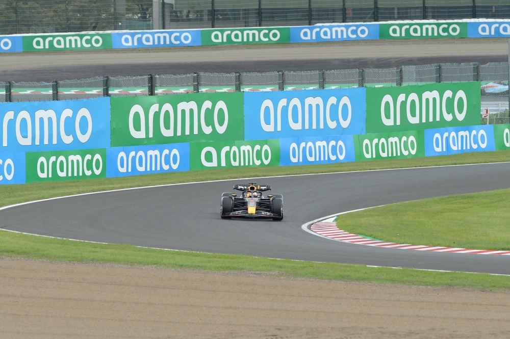 Red Bull's Max Verstappen during a practice session for the Japanese Grand Prix. Saudi Aramco has perhaps the most visible presence among fossil fuel giants at Formula One races as one of the series' top sponsors. Red Bull's Max Verstappen during a practice session for the Japanese Grand Prix. Saudi Aramco has perhaps the most visible presence among fossil fuel giants at Formula One races as one of the series' top sponsors.