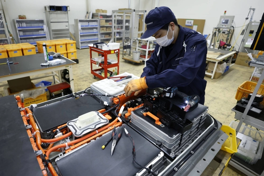 A rebound in auto output and falling raw material costs helped lift Japan's business sentiment in the third quarter. A rebound in auto output and falling raw material costs helped lift Japan's business sentiment in the third quarter.