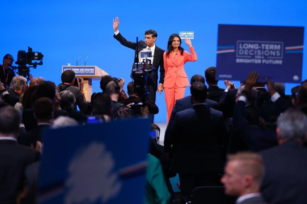 U.K. Prime Minster Rishi Sunak, left, and his wife Akshata Murty, on the closing day of the Conservative Party Conference in Manchester on Wednesday U.K. Prime Minster Rishi Sunak, left, and his wife Akshata Murty, on the closing day of the Conservative Party Conference in Manchester on Wednesday