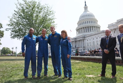 Artemis II moon mission crew members Victor Glover, Reid Wiseman, Jeremy Hansen and Christina Koch pose for photographs after taking part in a news conference with NASA Administrator Bill Nelson and U.S. Sen. Mark Kelly outside the U.S. Capitol in Washington on May 18. Artemis II moon mission crew members Victor Glover, Reid Wiseman, Jeremy Hansen and Christina Koch pose for photographs after taking part in a news conference with NASA Administrator Bill Nelson and U.S. Sen. Mark Kelly outside the U.S. Capitol in Washington on May 18.