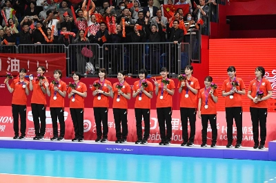 Japan's women's volleyball team celebrates its silver medal during the podium ceremony at the Asian Games in Hangzhou, China, on Saturday. Japan's women's volleyball team celebrates its silver medal during the podium ceremony at the Asian Games in Hangzhou, China, on Saturday.