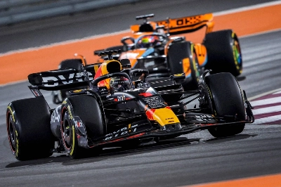 Red Bull's Max Verstappen drives ahead of McLaren's Oscar Piastri during the Qatar Grand Prix in Doha on Sunday. Red Bull's Max Verstappen drives ahead of McLaren's Oscar Piastri during the Qatar Grand Prix in Doha on Sunday.