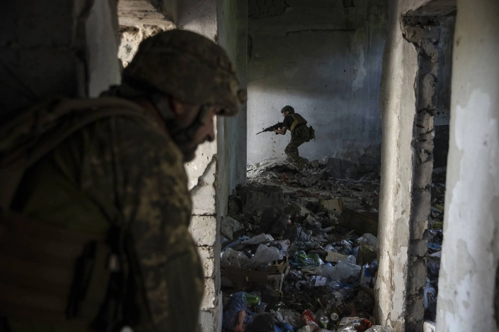 Ukrainian marines practice house-to-house combat during training exercises in the region of Vuhledar, Ukraine, on Aug. 25. Ukrainian marines practice house-to-house combat during training exercises in the region of Vuhledar, Ukraine, on Aug. 25.